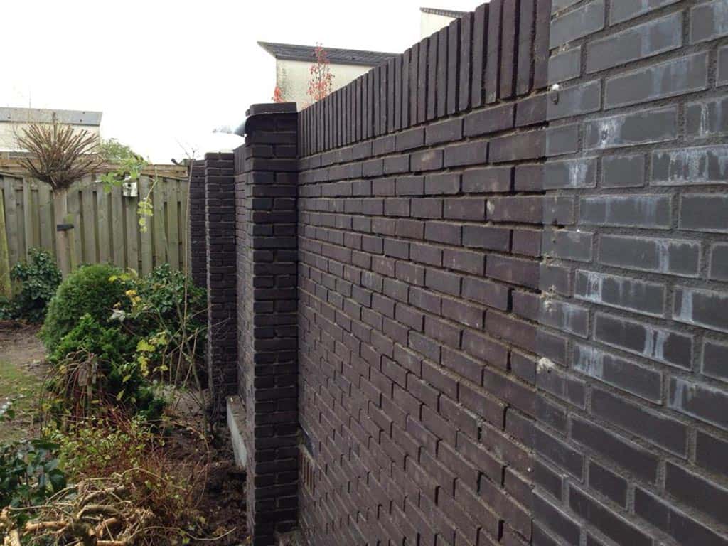 A van spelde hoveniers: stenen tuinmuren. Woonkamer set grijs