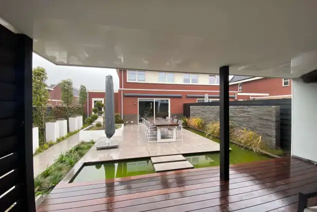 images/0000nieuws/2020/tuinoverkapping-tilburg/kaatsheuvel-luxe-tuin-overkapping-strak-en-modern-tuinaanleg-vakman-hovenier-635x424-d86