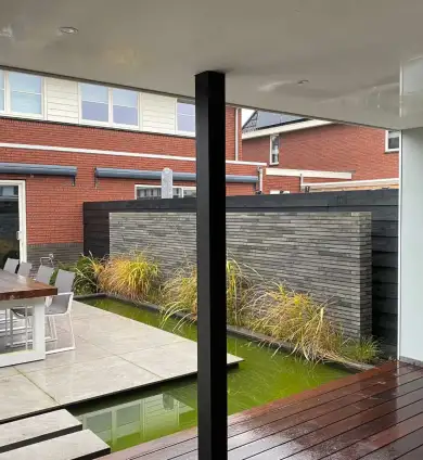 images/0000nieuws/2020/tuinoverkapping-tilburg/luxe-tuin-overkapping-strak-en-modern-tuinaanleg-vakman-hovenier-oisterwijk-390x424-b73