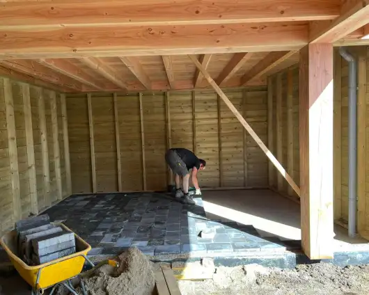 images/0000nieuws/2022/10-tuin-aanleggen-berkel-enschot/tuinoverkapping-plaatsen-douglas-hout-berkel-enschot-met-met-vloer-in-overkapping-530x424-71b