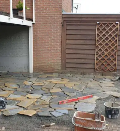 images/0000nieuws/2022/17-2-flagtone-s-gravendeel/23-2-flagstone-leggen-s-gravendeel-breda-oisterwijk-390x424-f7c