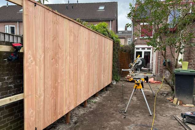 tuinschutting zetten met zwemvijer gemeente Tilburg