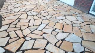 flagstone yellow brazil udenhout leggen in de tuin 