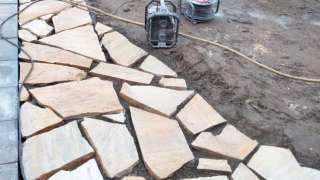 flagstone yellow brazil udenhout leggen in de tuin 