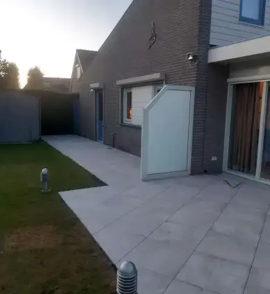 images/0000nieuws/2022/21-5-vlijmen/keramische-terras-tegels-leggen-breda-tilburg-waalwijk-390x424-435