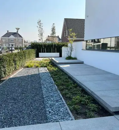 images/0000nieuws/2022/23-3-liem/tuinaanleg-rotterdam-moderne-tuin-schellevis-tegels-hoveniers-bedrijf-390x424-e29
