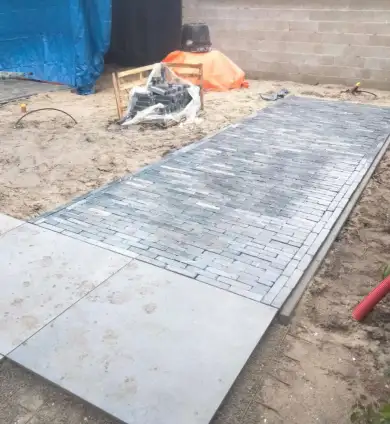 images/0000nieuws/2023/1-pim-noodermeer-amstelveen/tuin-aanleggen-amstelveen-keramische-tegels-390x424-af4