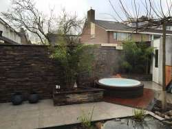 Moderne wellness tuin in Tilburg