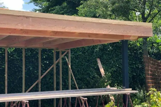 images/001-tuinaanleg-ettenleur/lies-sintmichelgestel/Tuinoverkapping-maken-kruispunt-635x424-9f7