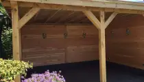 images/001-tuinaanleg-ettenleur/maatwerk-tuinoverkapping/12-Tuinoverkapping-maatwerk-met-natuursten-rand-Rosmalen-210x119-589