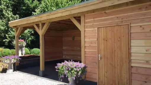 images/001-tuinaanleg-ettenleur/maatwerk-tuinoverkapping/5-tuinoverkapping-met-natuursteen-en-douglas-palen-staanders-510x287-a9e