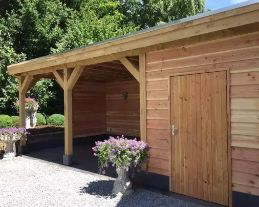images/001-tuinaanleg-ettenleur/maatwerk-tuinoverkapping/5-tuinoverkapping-met-natuursteen-en-douglas-palen-staanders-530x424-b5b