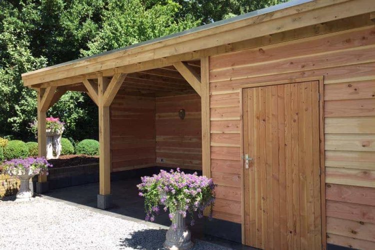 images/001-tuinaanleg-ettenleur/maatwerk-tuinoverkapping/5-tuinoverkapping-met-natuursteen-en-douglas-palen-staanders-750x500-8fa