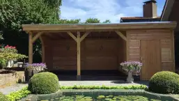 images/001-tuinaanleg-ettenleur/maatwerk-tuinoverkapping/9-Geschaafd-potdeksel-planken-douglas-hout-257x145-576