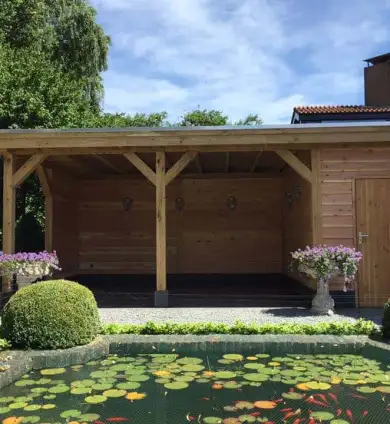 images/001-tuinaanleg-ettenleur/maatwerk-tuinoverkapping/9-Geschaafd-potdeksel-planken-douglas-hout-390x424-378