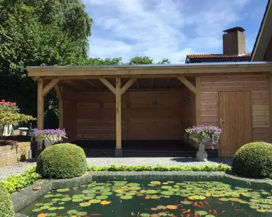 images/001-tuinaanleg-ettenleur/maatwerk-tuinoverkapping/9-Geschaafd-potdeksel-planken-douglas-hout-530x424-794