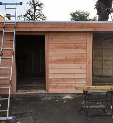 images/001-tuinaanleg-ettenleur/tuinschuur-oss/maatwerk-tuinschuur-potdeksel-planken-390x424-b1f