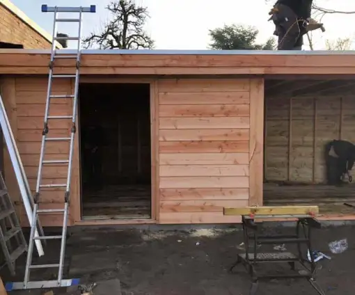 images/001-tuinaanleg-ettenleur/tuinschuur-oss/maatwerk-tuinschuur-potdeksel-planken-510x424-085