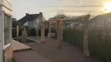 images/001-tuinaanleg-ettenleur/valkenswaard/pergola-zetten-natuurlijke-palen-160x90-6aa