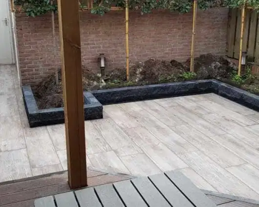 images/001-tuinaanleg-ettenleur/waalre-keramisch-tegels/keramisch-terras-tegels-leggen-530x424-9f4