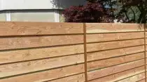 images/001-tuinaanleg-ettenleur/zweeds--potdeksel-planken-schutting/zweeds-rabat--douglashout-schutting-Vugt-Oisterwijk-210x118-e4f