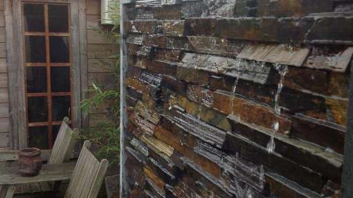 modern waterelement in een strakke tuin in Udenhout door a van spelde hoveniers