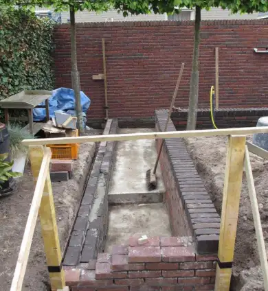 images/026 verboven/het metselen van een strakke vijver in dongen-390x424-865