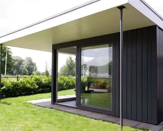 images/kruispunt schuttingen/13 luxe tuinkamer met glas pvc daktrim staal en hout tilburg veldhoven oosterbeek nijmgen tilburg berkel enschot luxe tuinhuize-530x424-336