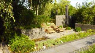 Moderne tuin aanleggen in Tilburg door a van spelde hoveniers