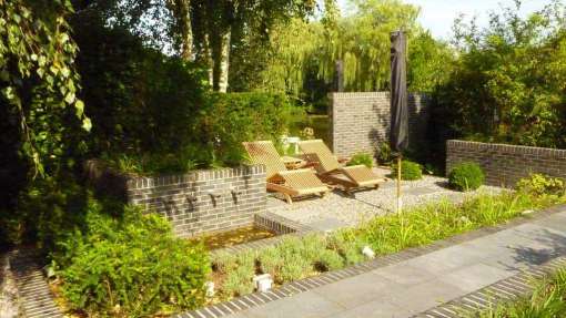 strakke tuin met hardsteen 40*60 in tilburg hovenier tuinarchitectuur tilburg breda eindhoven brabant den bosch vught tuin idee