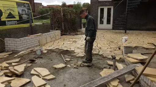 images/vlaardingen/vastzetten flagstones op een muur-510x287-8a6