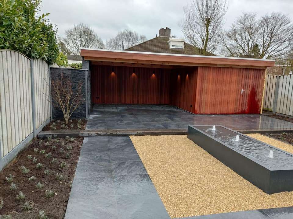 0000nieuws/2022/19-2-ellen/19-2-moderne-tuin-aanleggen-kaatsheuvel-met-keramische-tegels-luxe-tuinoverkapping-oisterwijk