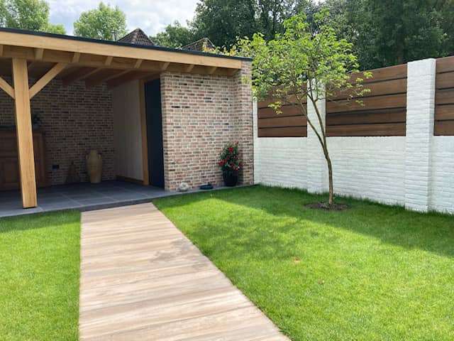 0000nieuws/2022/30-4-tuinoverkapping-tilburg/tuinoverkapping-plaatsen-tilburg-met-buitenhaard-oisterwijk-den-bosch