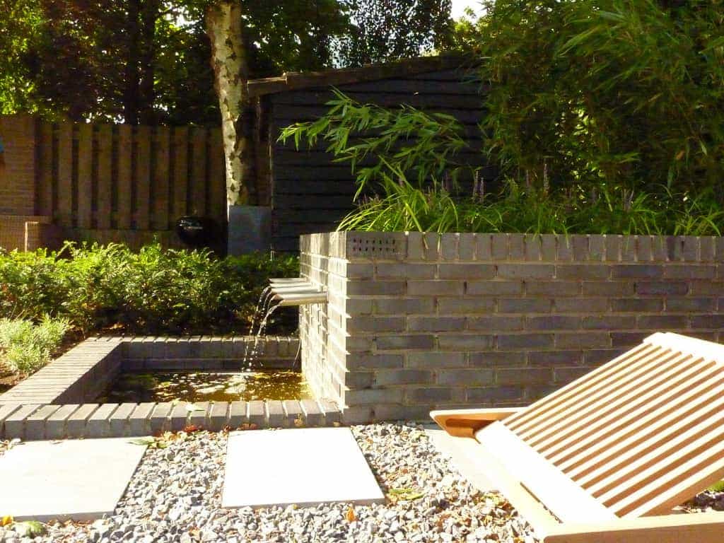 mes/6 strakke waterbak gecombineerd met split split in een moderne tuin hovenier 